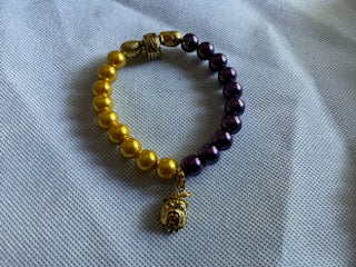 Purple and gold stretch bracelet