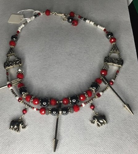 A doble stranded red,white , silver and hemitite beaded necklace with metal elephant and arrow charms - RK Queen B elegant Jewelry