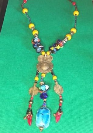 Afro-centric Queen B original necklace design with a brass pendant - RK Queen B elegant Jewelry