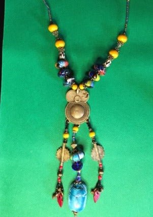 Afro-centric Queen B original necklace design with a brass pendant - RK Queen B elegant Jewelry