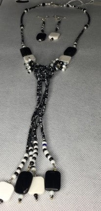 Black and white beaded necklace set with shimmering glass seed beads. - RK Queen B elegant Jewelry